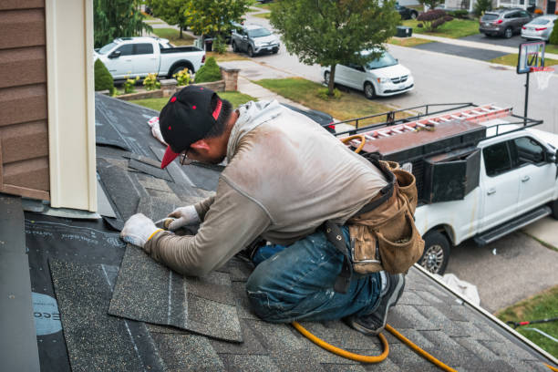 Professional Roofing technician working in Walpole, MA